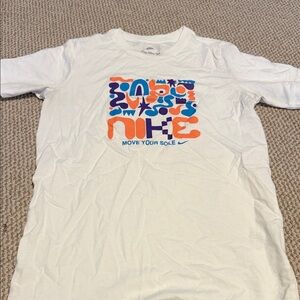Nike Kids White Tee with Colorful Graphic